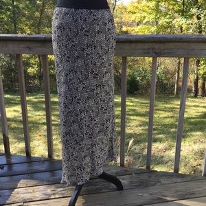 Long asymmetrical skirt